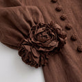 Brown dress with floral print and button-down mini length — Brown