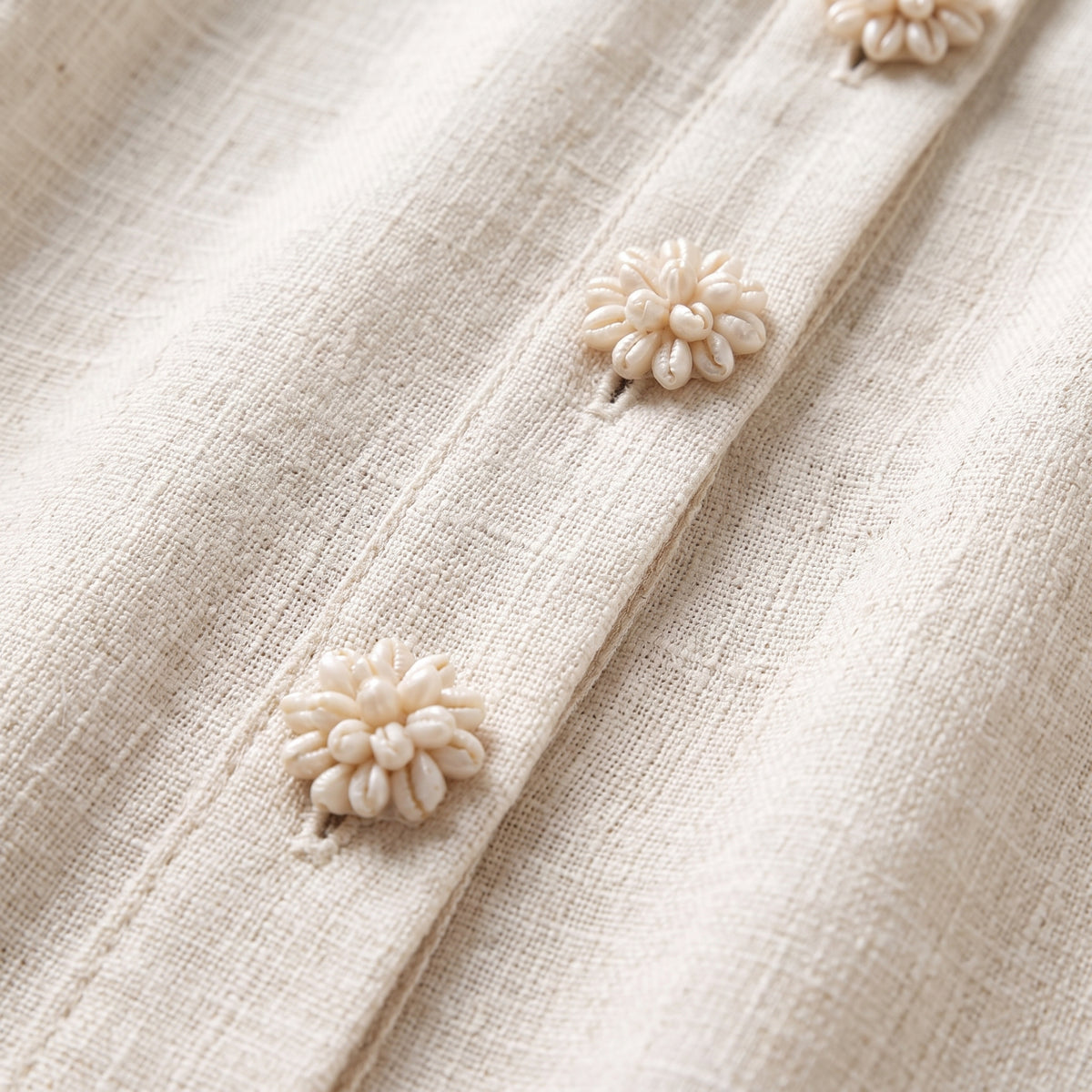 Brown dress with floral print and button-down mini length — White